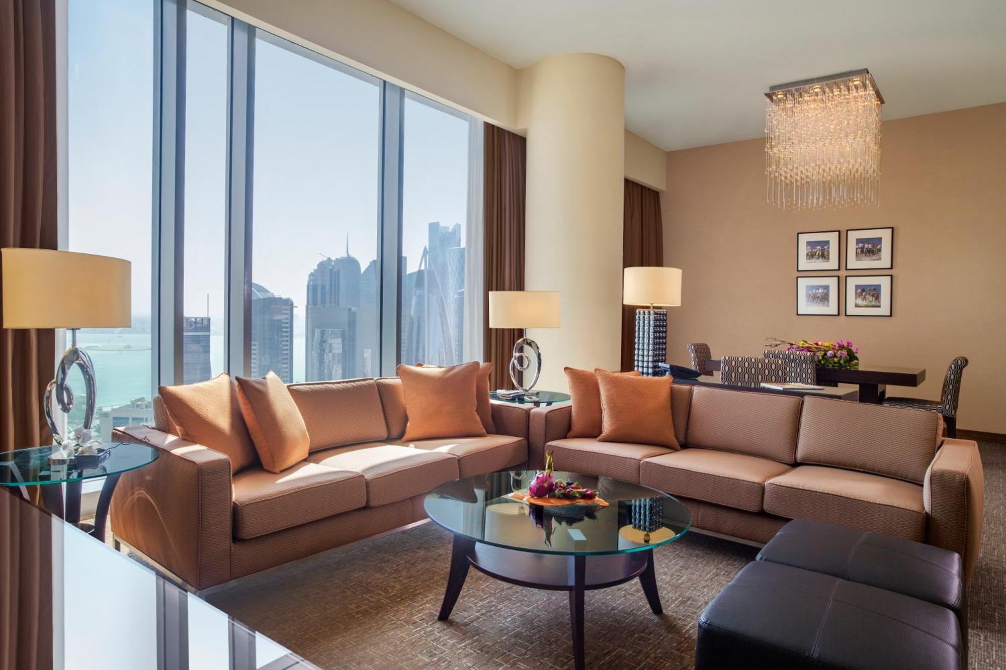 City Centre Rotana Doha Exterior foto A living room in a suite at the Ritz-Carlton, DIFC